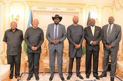 President of South Sudan Salva Kiir Mayardit, Ralph Mupita with their team