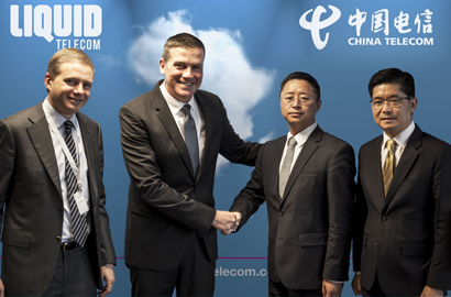 Nic Rudnick and Willem Marais of Liquid Telecom, Changhai Liu and Donald Tan of China Telecom